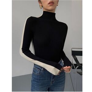 Off white and black two toned fitted sweater!